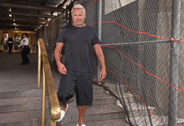 Fashion designer Bobby Vaughn, 48, left the courthouse alone after his arraignment for assault on Monday afternoon