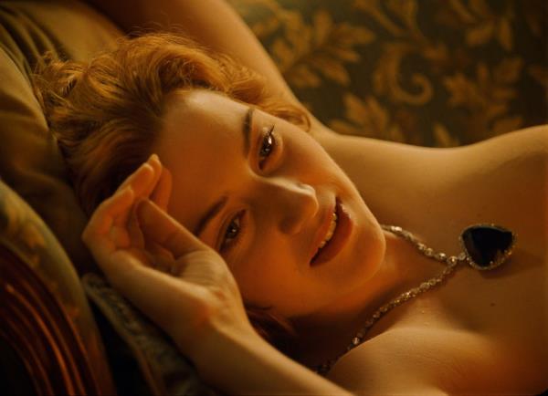 The actress said DiCaprio “couldn’t stop laughing” when they filmed kiss scenes.